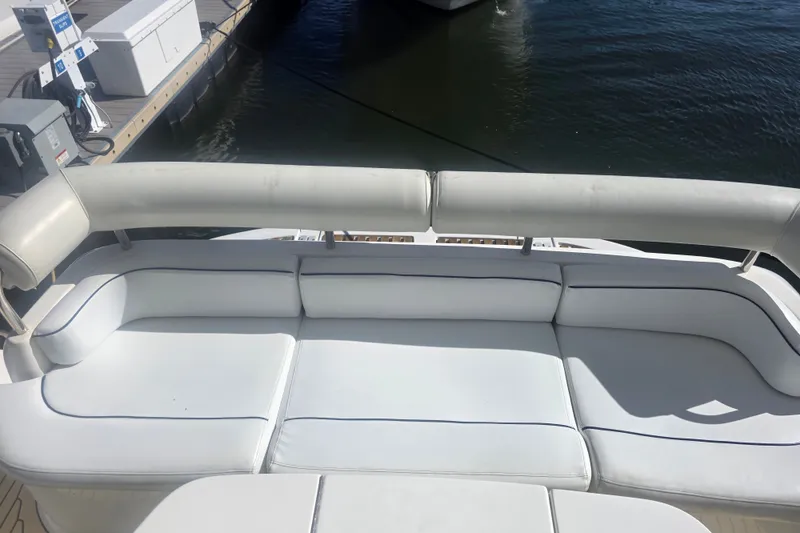 Slide: The Image of Luxurious seating on 2002 Neptunus 56 Flybridge yacht at marina dock. - 23