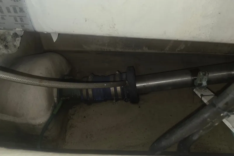 Slide: The Image of Engine compartment of a 2002 Neptunus 56 Flybridge yacht, showing mechanical components. - 47