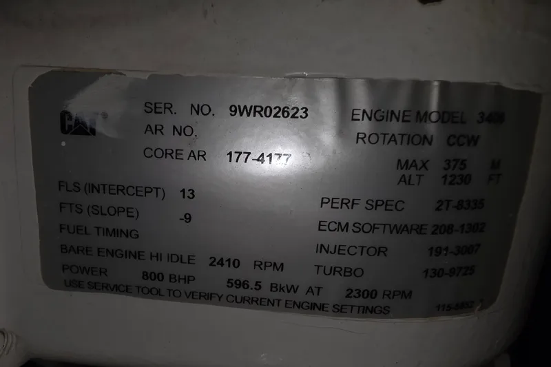 Slide: The Image of Engine specifications plate for Neptunus 56 Flybridge 2002, featuring CAT engine model 3406. - 40
