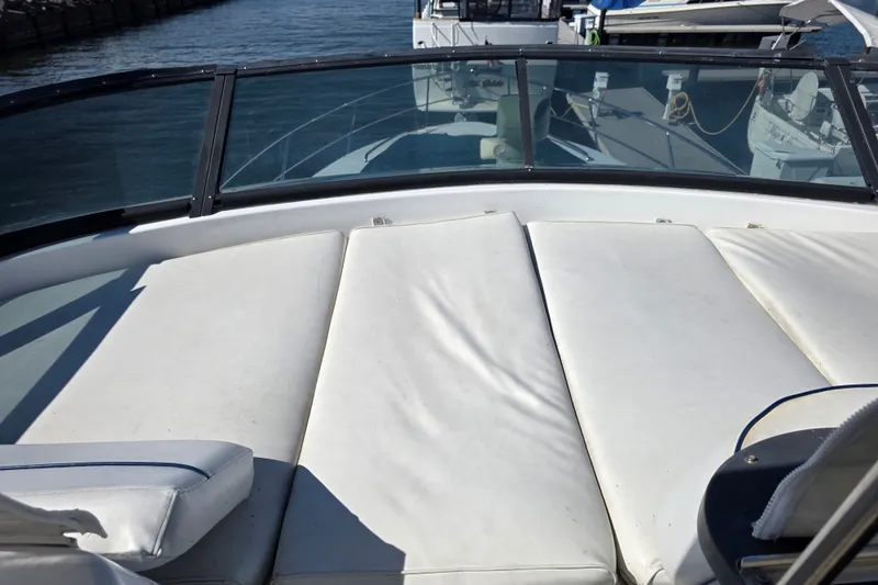 Slide: The Image of 2002 Neptunus 56 Flybridge yacht with spacious sunbathing area and sleek design. - 16