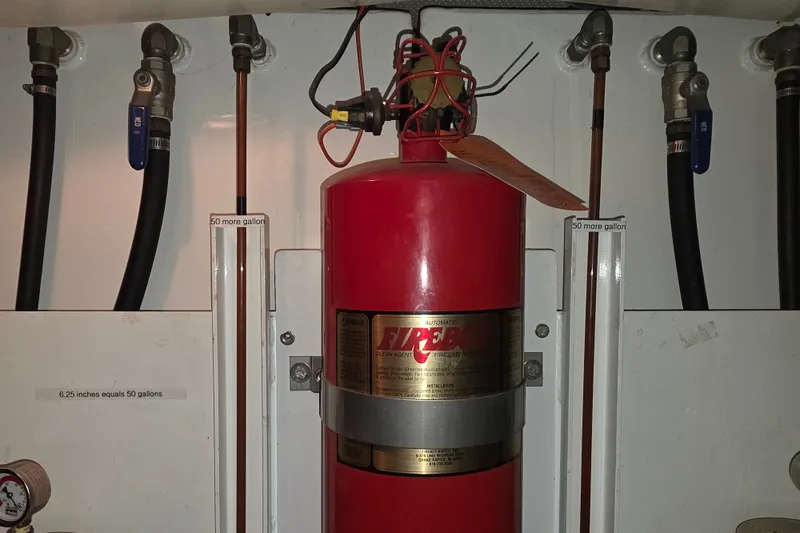 Slide: The Image of Fire suppression system in a 2002 Neptunus 56 Flybridge engine room. - 28