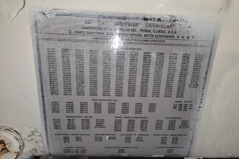 Slide: The Image of Caterpillar patent plate on a 2002 Neptunus 56 Flybridge yacht engine. - 45