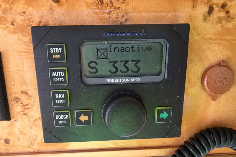 Slide: The Image of Simrad Robertson AP22 autopilot display on 2002 Neptunus 56 Flybridge yacht. - 58