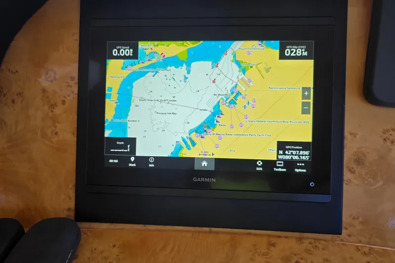 Slide: The Image of Garmin navigation display on 2002 Neptunus 56 Flybridge, showing detailed nautical map. - 57