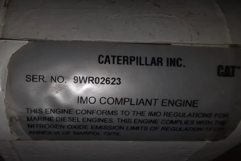 Slide: The Image of Caterpillar engine label on 2002 Neptunus 56 Flybridge, IMO compliant, serial 9WR02623. - 42