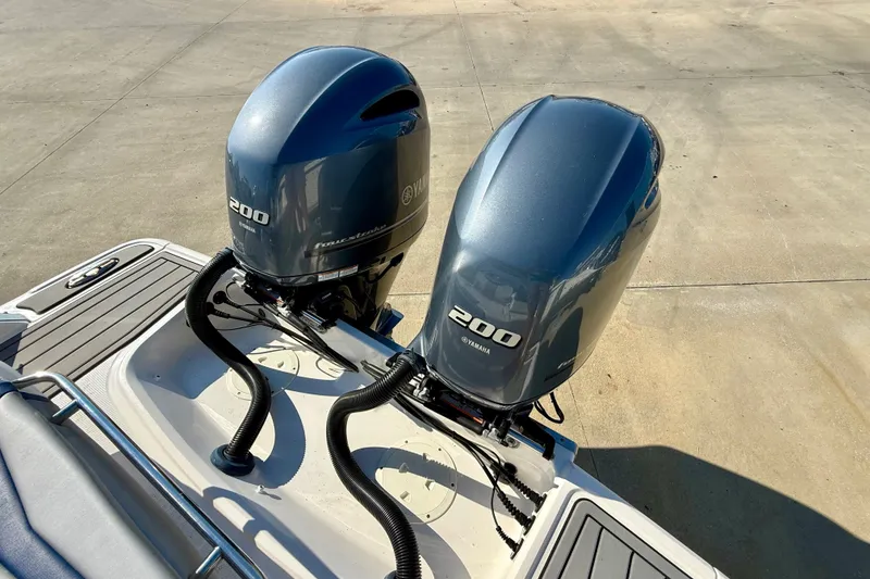 Slide: The Image of Twin Yamaha 200 outboard engines on a 2021 Chaparral 280 OSX boat. - 31