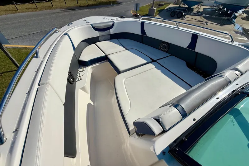 Slide: The Image of 2021 Chaparral 280 OSX boat interior with spacious seating and sleek design. - 14