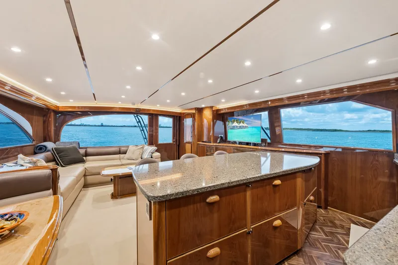 Slide: The Image of Luxurious interior of 2014 Viking 70C yacht with ocean view and elegant furnishings. - 65