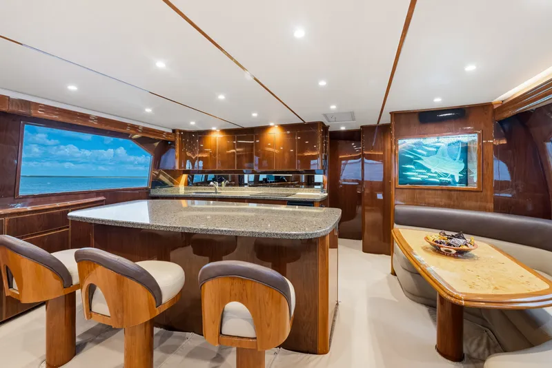 Slide: The Image of Luxurious interior of 2014 Viking 70C yacht with elegant wood finishes and modern amenities. - 63