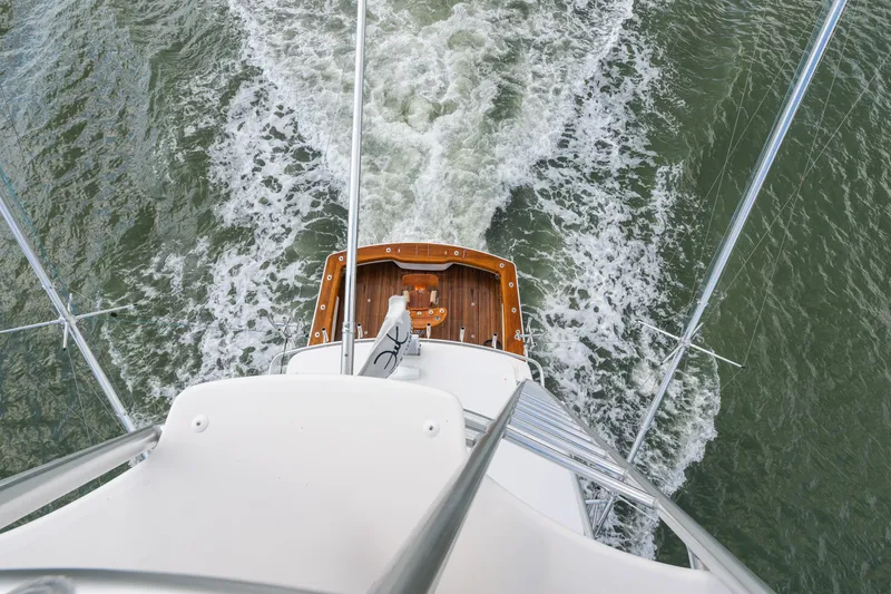 Slide: The Image of Aerial view of 2014 Viking 70C yacht cruising through water. - 39