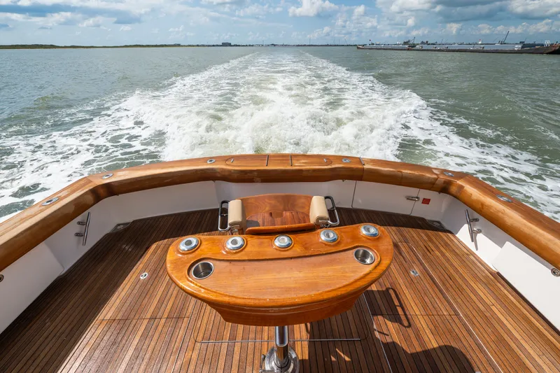 Slide: The Image of Luxury Viking 70C yacht deck with wooden finish, cruising on open water, 2014 model. - 23