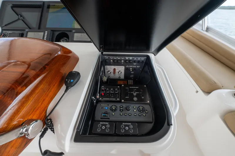 Slide: The Image of Control panel of a 2014 Viking 70C yacht with advanced navigation equipment. - 30