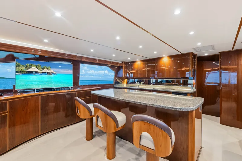 Slide: The Image of Luxurious interior of 2014 Viking 70C yacht with elegant wood finishes and modern amenities. - 62