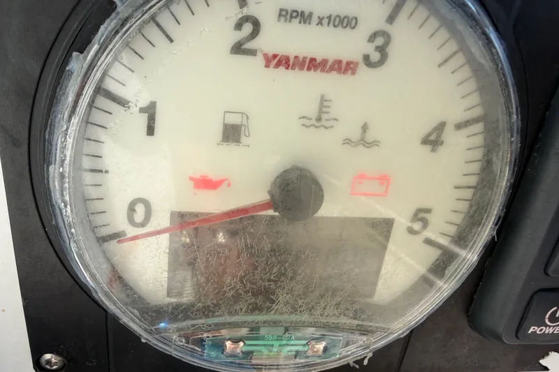 Slide: The Image of Close-up of a Yanmar tachometer on a 2021 Beneteau Oceanis 30.1 sailboat. - 29