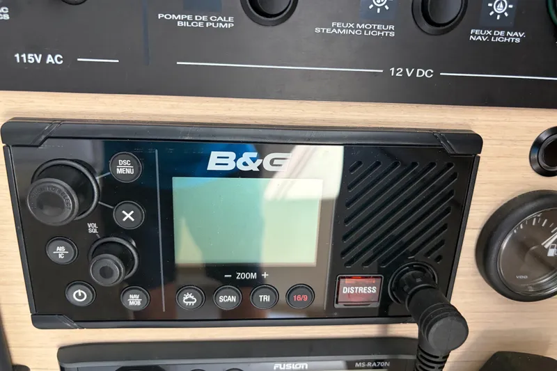 Slide: The Image of B&G marine radio on 2021 Beneteau Oceanis 30.1 yacht control panel. - 8