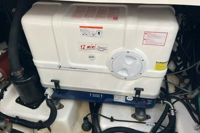 Slide: The Image of Fischer Panda generator in 2019 Boston Whaler 380 Realm boat engine room. - 23