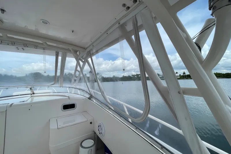 Slide: The Image of 2001 Intrepid 377 Walkaround boat interior with clear view of calm waters. - 36