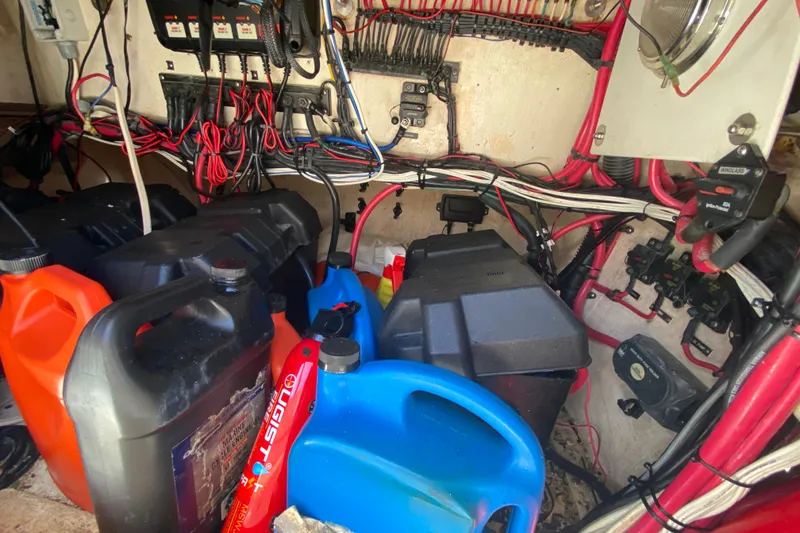 Slide: The Image of Engine compartment of a 2001 Intrepid 377 Walkaround with fuel containers and wiring. - 45