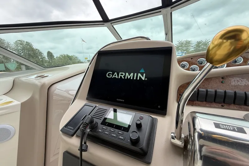 Slide: The Image of Control panel of a 2000 Sea Ray 340 Sundancer with Garmin navigation system. - 29