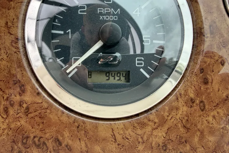 Slide: The Image of Close-up of a 2000 Sea Ray 340 Sundancer RPM gauge showing 949.1 hours. - 26