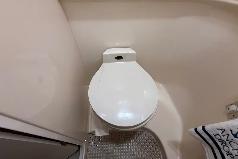 Slide: The Image of Boat bathroom with toilet in 2000 Sea Ray 340 Sundancer. - 56