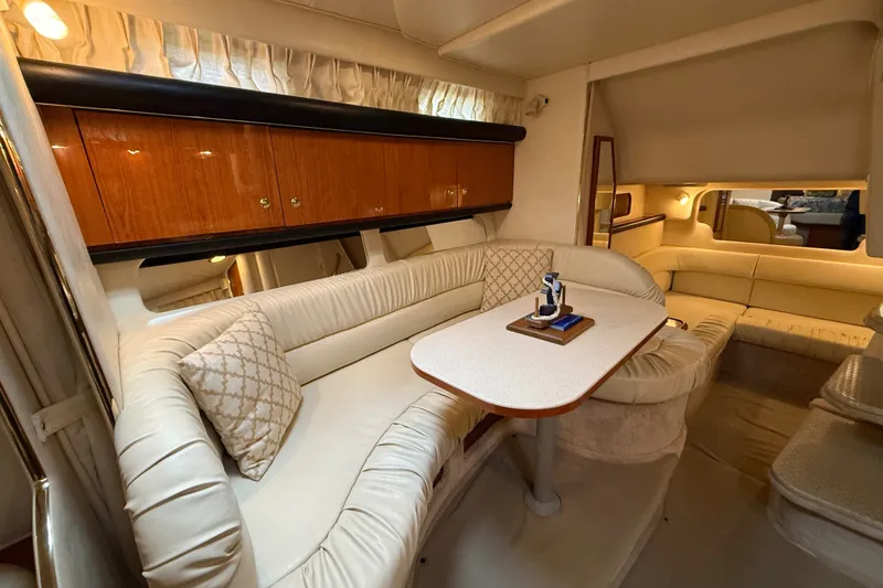 Slide: The Image of Luxurious interior of a 2000 Sea Ray 340 Sundancer yacht with plush seating and elegant decor. - 50