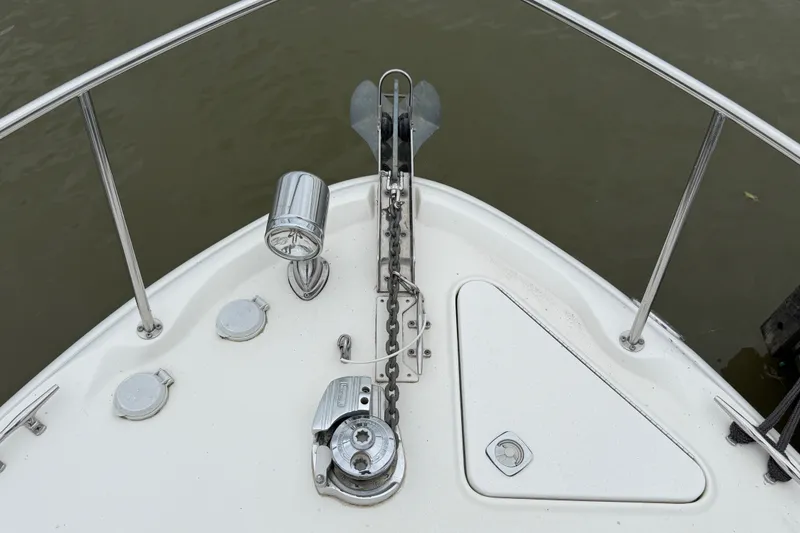 Slide: The Image of Bow of 2000 Sea Ray 340 Sundancer with anchor and railing details. - 5