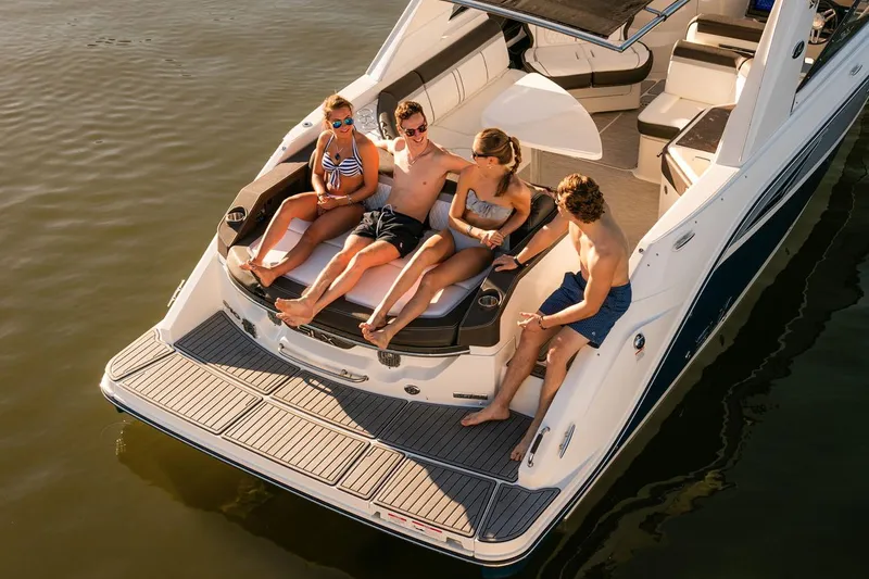 Slide: The Image of Manufacturer Provided Image: People relaxing on a 2017 Sea Ray SLX 310 boat in the water. - 3