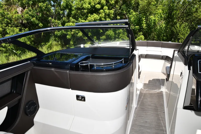 Slide: The Image of 2017 Sea Ray SLX 310 boat interior with sleek seating and modern design. - 29
