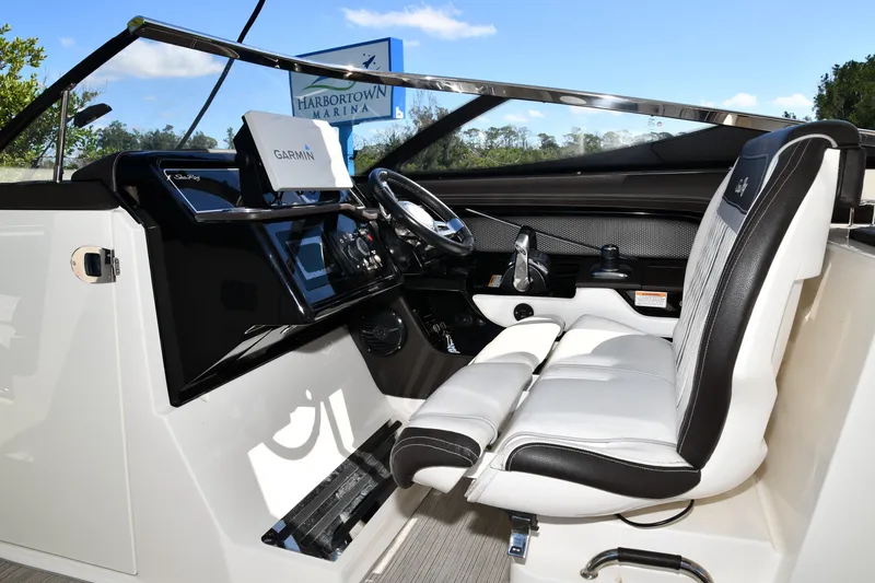 Slide: The Image of 2017 Sea Ray SLX 310 boat cockpit with Garmin navigation system at Harbortown Marina. - 27