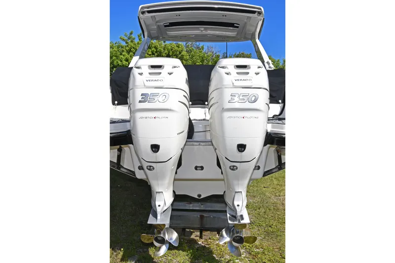 Slide: The Image of Twin Mercury Verado 350 engines on a 2017 Sea Ray SLX 310 boat. - 10