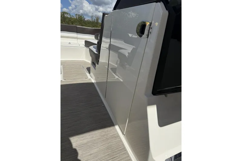 Slide: The Image of 2017 Sea Ray SLX 310 boat interior with sleek design and modern features. - 2