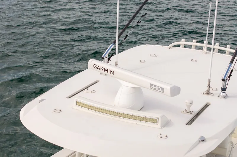 Slide: The Image of 2017 SeaVee 390Z boat with Garmin xHD2 radar on the roof, ocean background. - 17