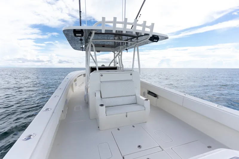 Slide: The Image of 2017 SeaVee 390Z boat on open water under a clear sky. - 42
