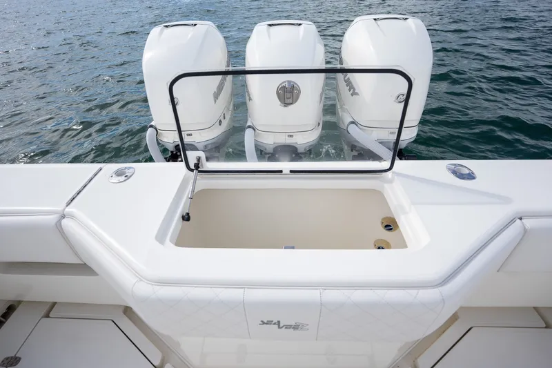 Slide: The Image of 2017 SeaVee 390Z boat with triple Mercury outboard engines on the water. - 35