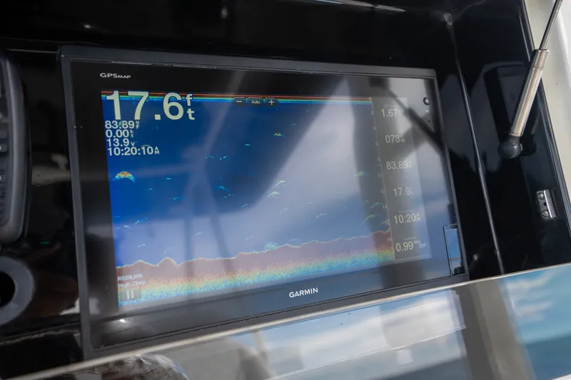 Slide: The Image of Garmin GPS display on 2017 SeaVee 390Z showing depth and sonar data. - 31