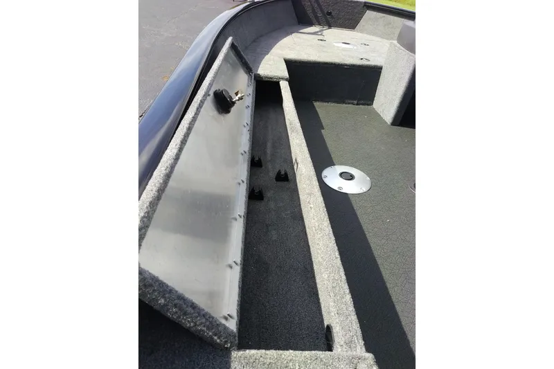 Slide: The Image of 2027 Tracker Super Guide V-16 SC boat interior storage compartment. - 14