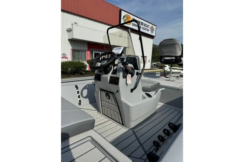 Slide: The Image of 2027 Tracker Bass Tracker 175 CC boat interior with steering console at service center. - 13