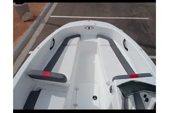 Slide: The Image of 2027 Tahoe T16 boat interior with sleek white and gray seating design. - 11