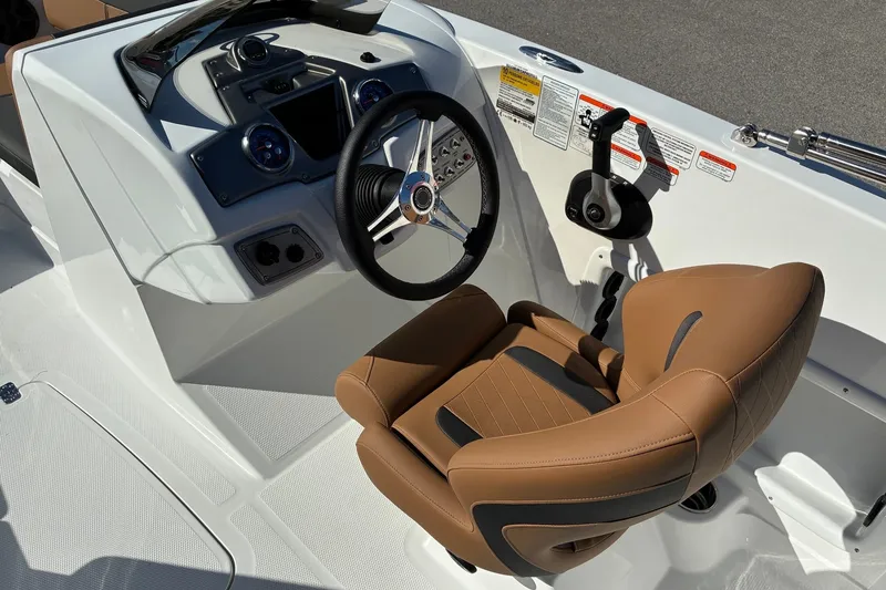 Slide: The Image of Luxurious cockpit of 2027 Tahoe 1950 boat with modern steering and controls. - 8