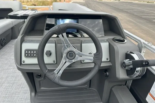 Slide: The Image of Steering console of 2027 Sun Tracker SportFish 22 DLX pontoon boat. - 21