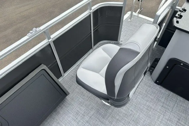 Slide: The Image of 2027 Sun Tracker SportFish 22 DLX boat interior with gray seating and flooring. - 23