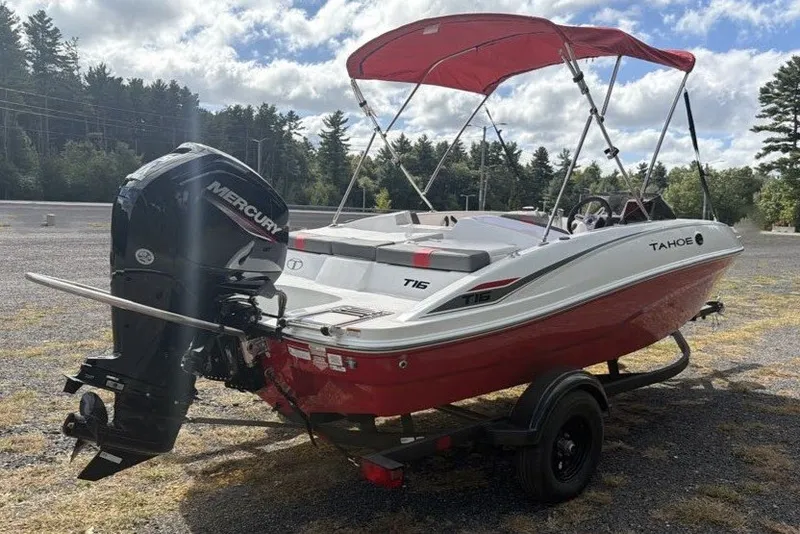 Slide: The Image of 2027 Tahoe T16 boat with red canopy and Mercury outboard motor on trailer. - 4