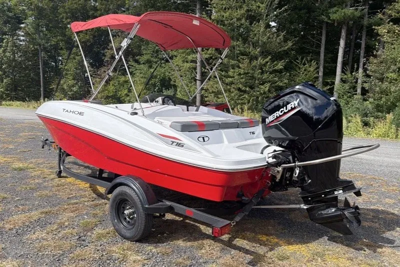 Slide: The Image of 2027 Tahoe T16 boat with red canopy and Mercury outboard motor on trailer. - 3