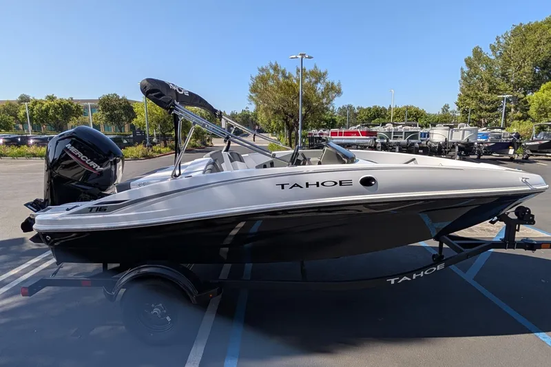 Slide: The Image of 2027 Tahoe T16 boat in parking lot, featuring sleek design and Mercury engine. - 4