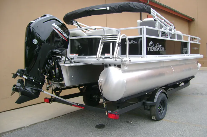 The Image of 2027 Sun Tracker Bass Buggy 18 DLX pontoon boat with Mercury outboard motor. - 0