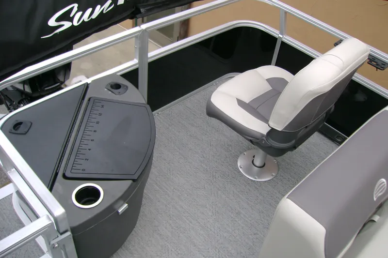 Slide: The Image of 2027 Sun Tracker Bass Buggy 18 DLX interior with fishing seat and measuring station. - 14