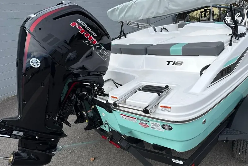 Slide: The Image of 2027 Tahoe T18 boat with Mercury Pro XS engine, featuring sleek design and modern features. - 3