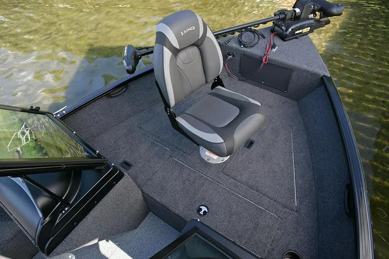 Slide: The Image of Manufacturer Provided Image: 2023 Lund 1650 Rebel XL Sport boat interior with seating and fishing equipment. - 19