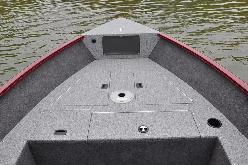 Slide: The Image of Manufacturer Provided Image: 2023 Lund 1650 Rebel XL Sport boat deck on calm water. - 17